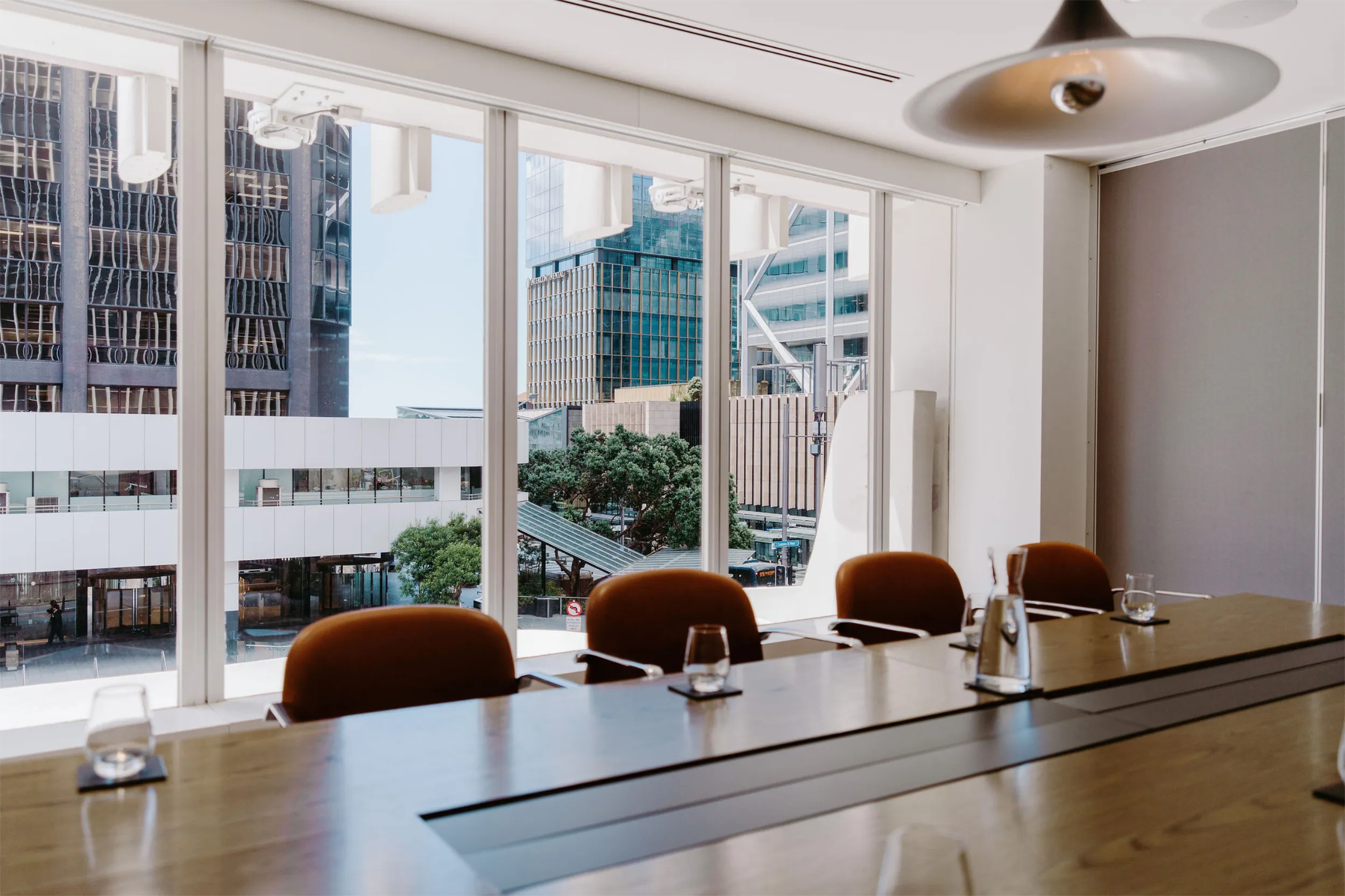 a boardroom and window view from 1 Albert Street